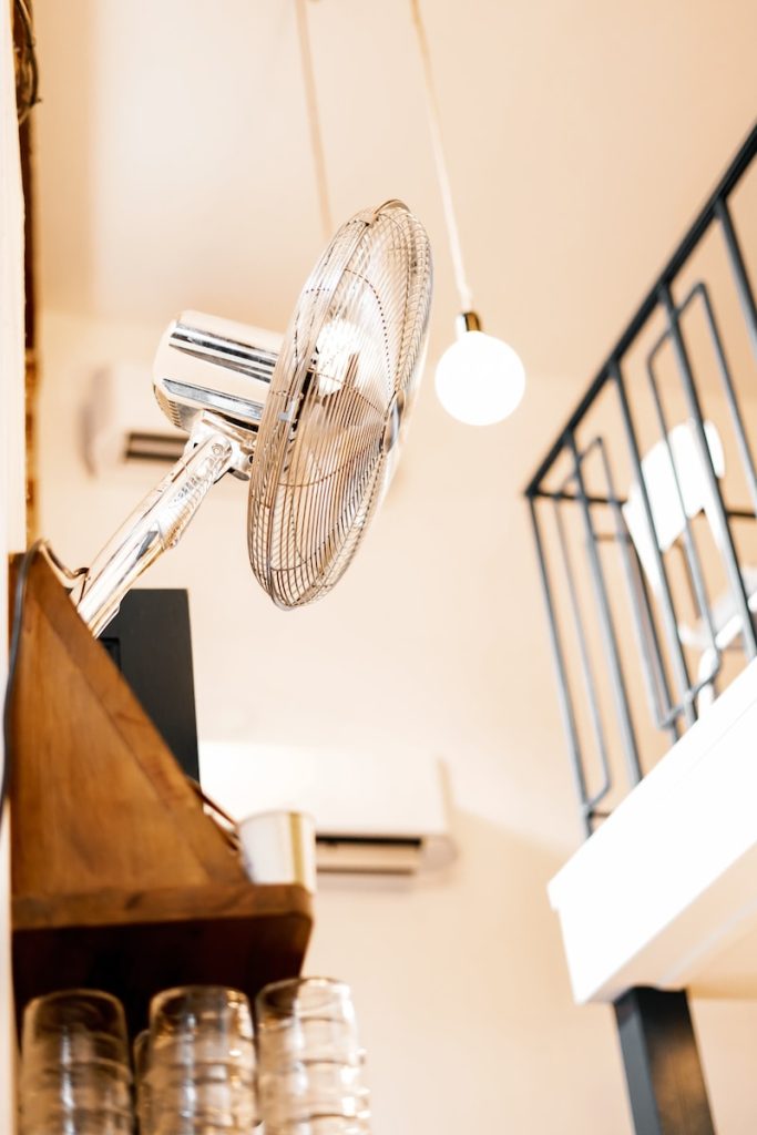 a fan is hanging from the ceiling in a room